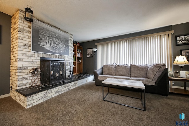 carpeted living area with a fireplace