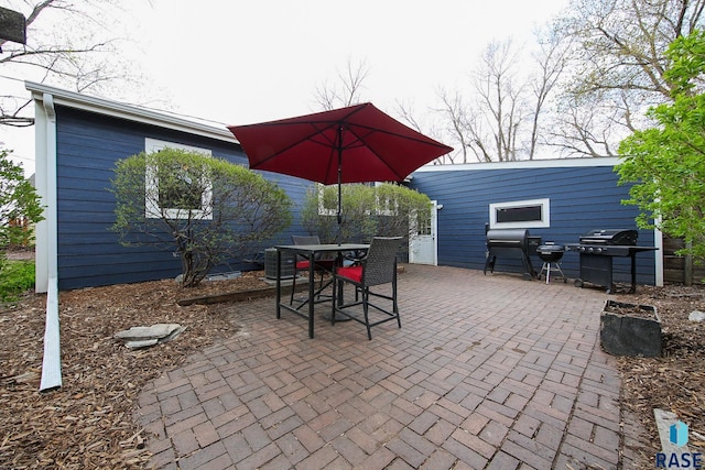 view of patio / terrace with grilling area and outdoor dining space
