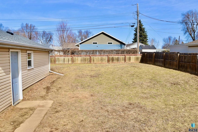 view of yard featuring a fenced backyard