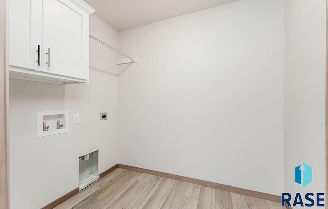 1125 E Wayne Pl, Tea, SD 57064 - laundry room featuring cabinet space, light wood-style floors, hookup for a washing machine, baseboards, and electric dryer hookup