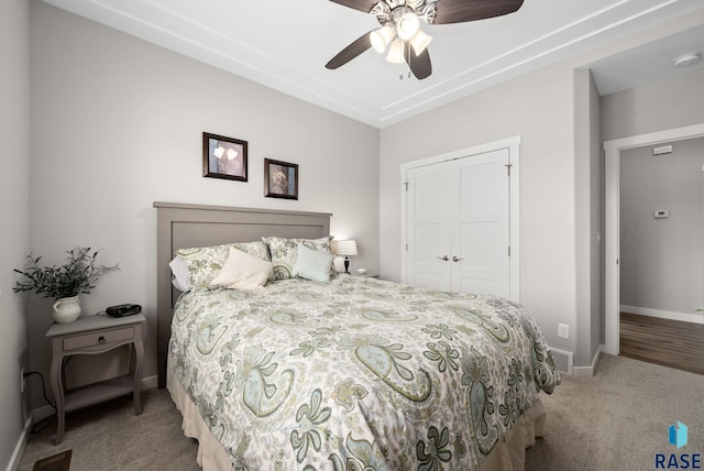 922 Johnson Creek Ct, Harrisburg, SD 57032 - bedroom featuring carpet flooring, a closet, baseboards, and a ceiling fan