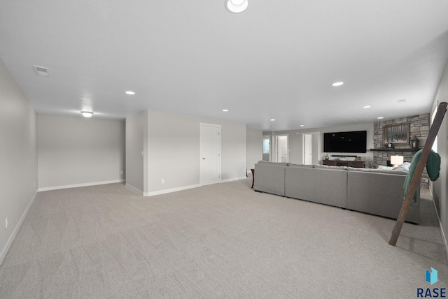 922 Johnson Creek Ct, Harrisburg, SD 57032 - carpeted living area with baseboards and recessed lighting