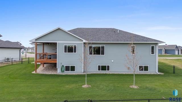 922 Johnson Creek Ct, Harrisburg, SD 57032 - back of property featuring roof with shingles and a deck