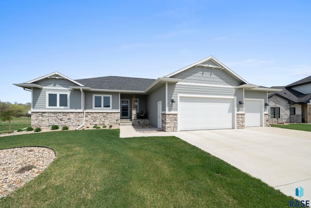 922 Johnson Creek Ct, Harrisburg, SD 57032 - craftsman-style house featuring an attached garage, concrete driveway, stone siding, and a front yard
