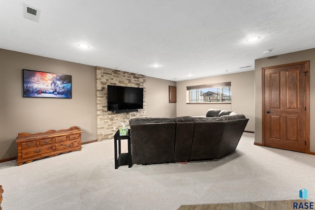 living room featuring baseboards, light colored carpet, recessed lighting, and visible vents