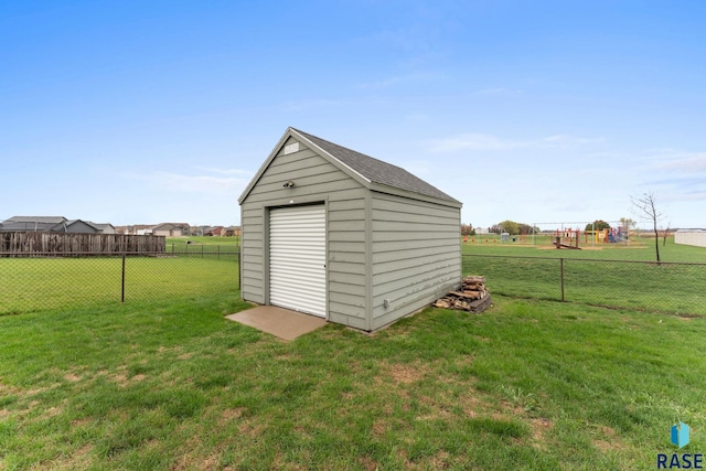 view of shed with a fenced backyard
