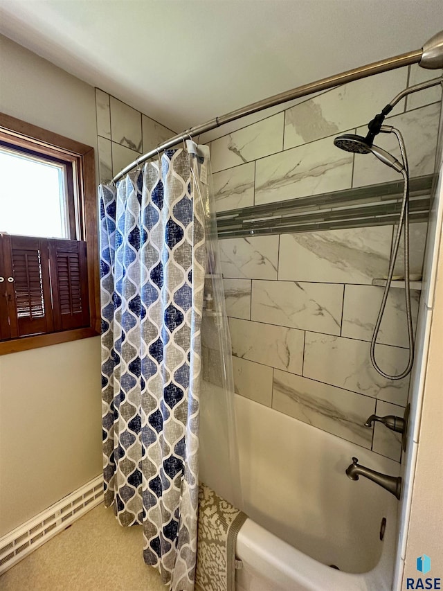 full bath featuring baseboard heating and shower / bath combo