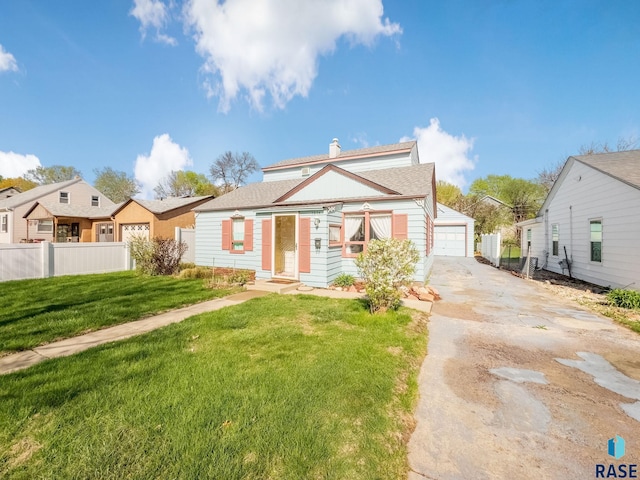 bungalow-style house featuring a garage, a front lawn, fence, and a chimney