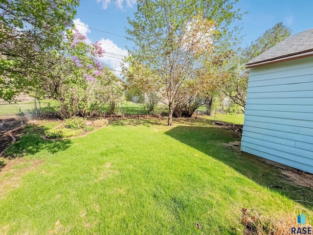 view of yard featuring fence