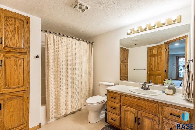 bathroom featuring a textured ceiling, visible vents, vanity, toilet, and shower / bath combo with shower curtain