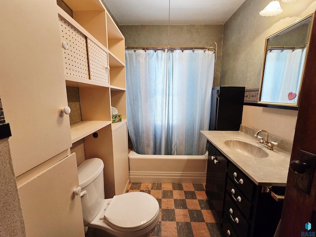bathroom featuring vanity, tile patterned floors, shower / bath combination with curtain, and toilet