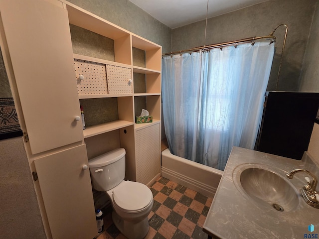full bath featuring tile patterned floors, vanity, toilet, and shower / tub combo