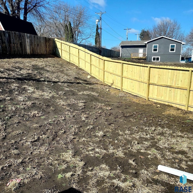 813 S Edward Cir, Sioux Falls, SD 57103 - view of yard featuring a fenced backyard