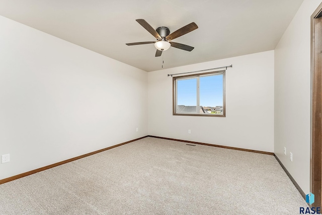 5714 S Woodlily Ave, Sioux Falls, SD 57108 - unfurnished room with baseboards and light carpet