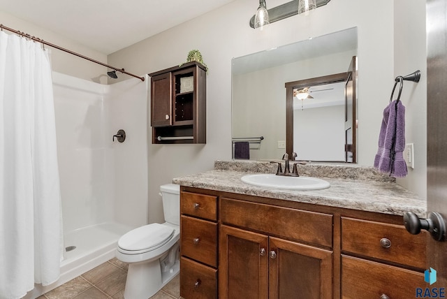 full bath with toilet, a shower with curtain, tile patterned flooring, ceiling fan, and vanity