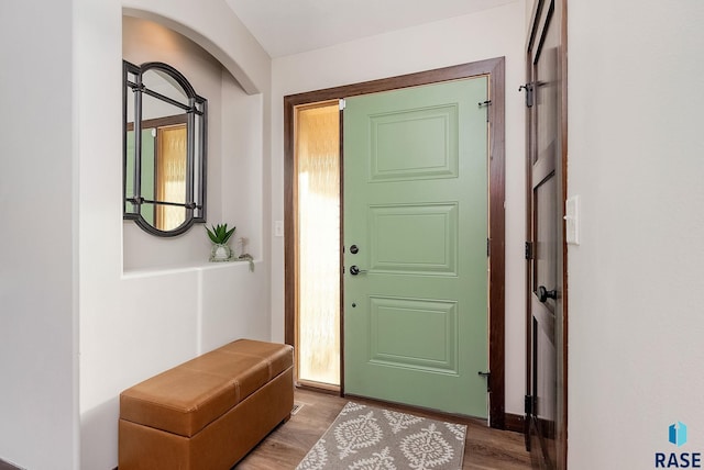 doorway to outside featuring wood finished floors