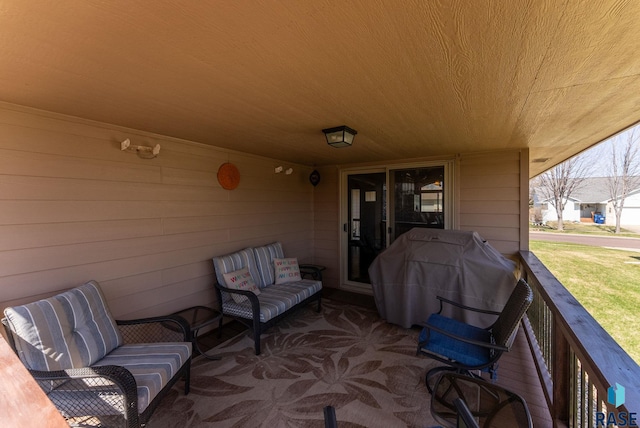 view of patio / terrace with area for grilling and an outdoor living space