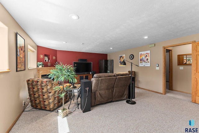 living area featuring carpet floors, baseboards, and recessed lighting