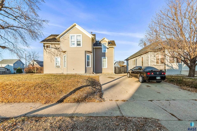 view of front of house with concrete driveway