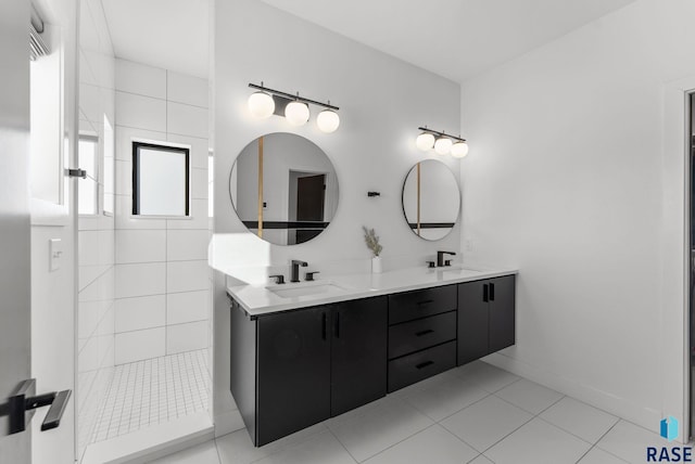 112 N Harvest Hill Cir, Sioux Falls, SD 57110 - full bathroom featuring walk in shower, double vanity, tile patterned flooring, and a sink