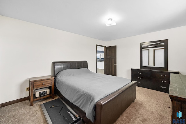 46902 284th St, Lennox, SD 57039 - bedroom with carpet flooring and baseboards