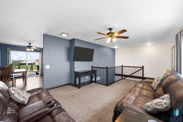 46902 284th St, Lennox, SD 57039 - carpeted living area featuring baseboards and a ceiling fan