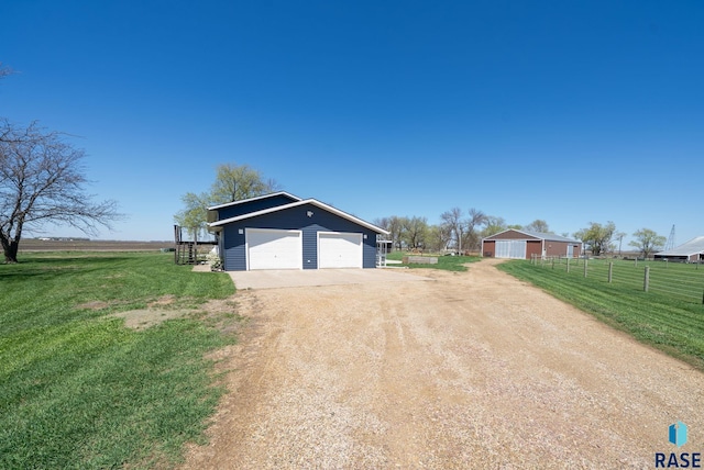46902 284th St, Lennox, SD 57039 - exterior space featuring dirt driveway and fence
