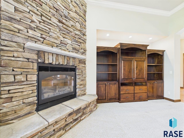 6204 S Doral Trl, Sioux Falls, SD 57108 - unfurnished living room featuring carpet, crown molding, recessed lighting, baseboards, and a stone fireplace