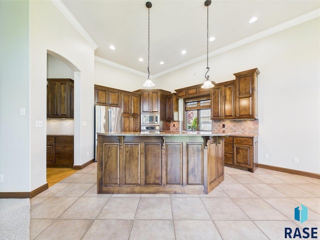 6204 S Doral Trl, Sioux Falls, SD 57108 - kitchen featuring stainless steel appliances, tasteful backsplash, a spacious island, light tile patterned floors, and ornamental molding