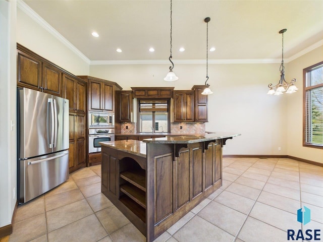 6204 S Doral Trl, Sioux Falls, SD 57108 - kitchen with appliances with stainless steel finishes, open shelves, backsplash, light tile patterned flooring, and crown molding