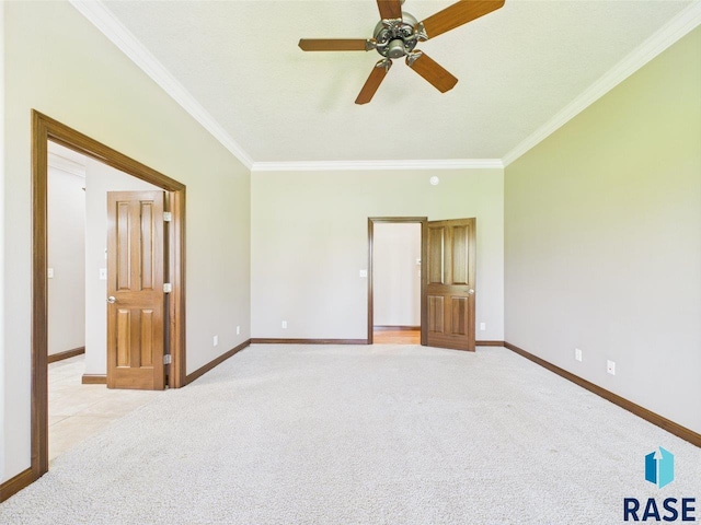 6204 S Doral Trl, Sioux Falls, SD 57108 - empty room featuring crown molding, light colored carpet, baseboards, and ceiling fan