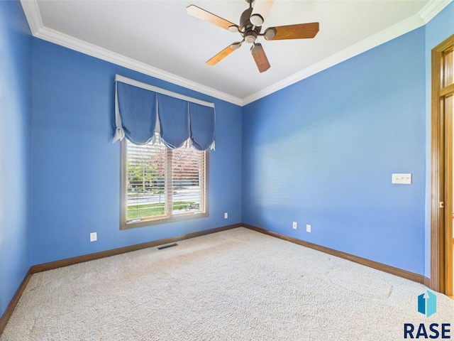 6204 S Doral Trl, Sioux Falls, SD 57108 - unfurnished room with carpet, baseboards, crown molding, and a ceiling fan