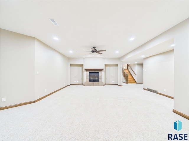 6204 S Doral Trl, Sioux Falls, SD 57108 - unfurnished living room featuring light colored carpet, baseboards, recessed lighting, a fireplace, and ceiling fan