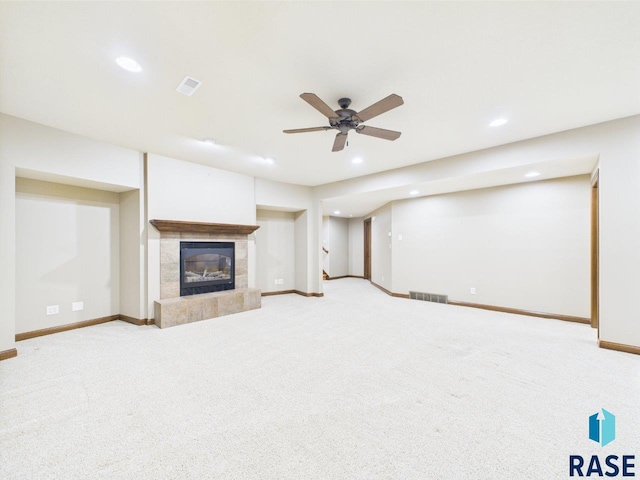 6204 S Doral Trl, Sioux Falls, SD 57108 - unfurnished living room with recessed lighting, carpet floors, a high end fireplace, baseboards, and ceiling fan