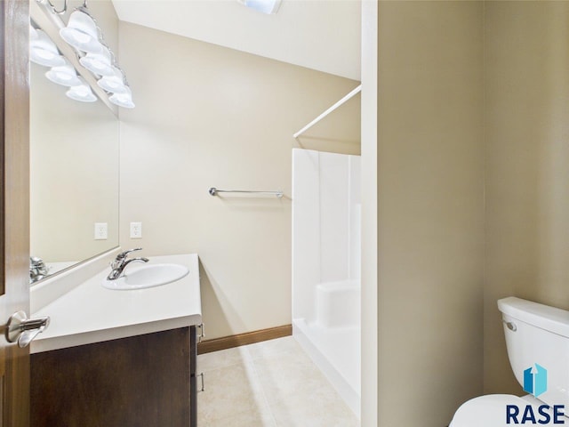 6204 S Doral Trl, Sioux Falls, SD 57108 - bathroom with tile patterned floors, toilet, vanity, a shower, and baseboards
