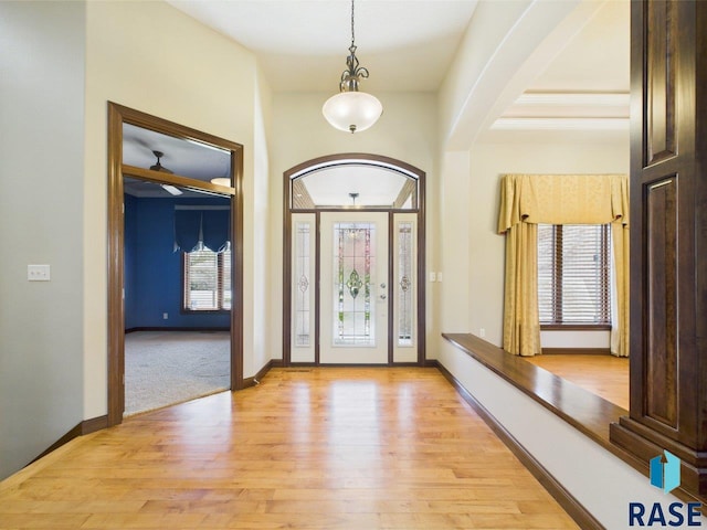 6204 S Doral Trl, Sioux Falls, SD 57108 - foyer entrance with healthy amount of natural light, light wood-style floors, and baseboards