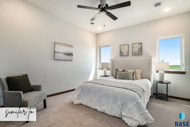 5704 E Avett Pl, Sioux Falls, SD 57108 - bedroom with baseboards, ceiling fan, carpet flooring, and visible vents