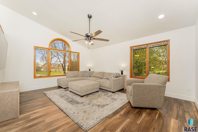 living room with baseboards, recessed lighting, ceiling fan, and wood finished floors