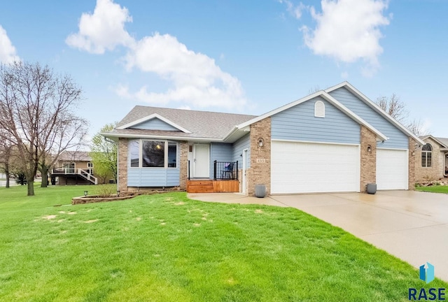 ranch-style house featuring a garage, a front lawn, brick siding, and driveway