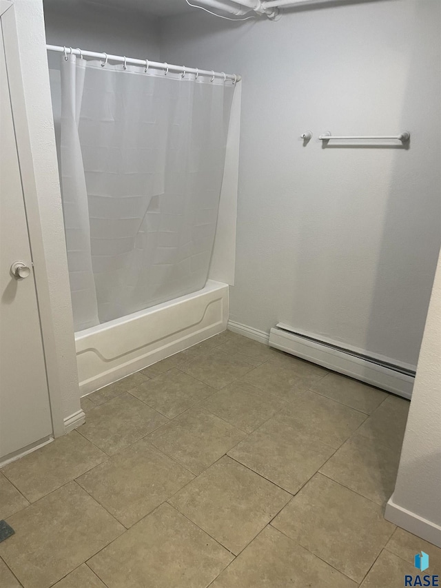 207 W 14th St, Sioux Falls, SD 57104 - full bathroom with baseboards, shower / tub combo with curtain, baseboard heating, and tile patterned flooring