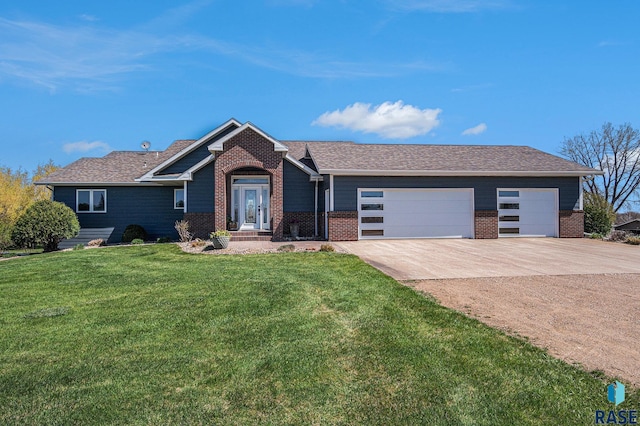 6601 Lenola Hts, Wentworth, SD 57075 - ranch-style house featuring concrete driveway, a front lawn, brick siding, and an attached garage
