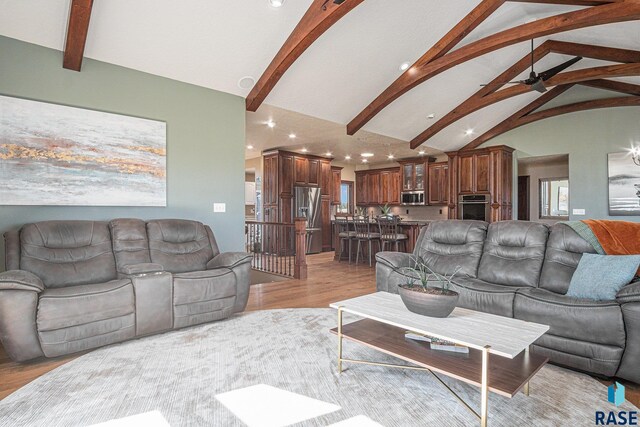6601 Lenola Hts, Wentworth, SD 57075 - living room with recessed lighting, lofted ceiling with beams, ceiling fan, and light wood-style floors