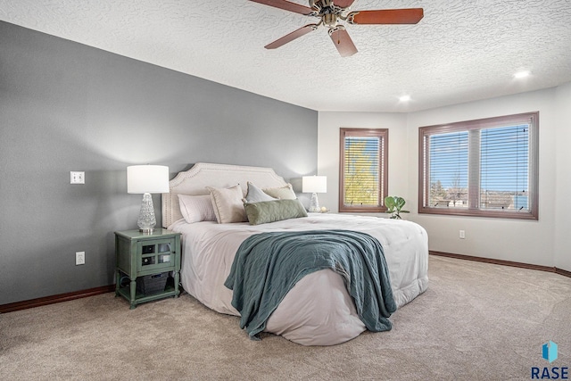 6601 Lenola Hts, Wentworth, SD 57075 - bedroom with a textured ceiling, baseboards, ceiling fan, light colored carpet, and recessed lighting