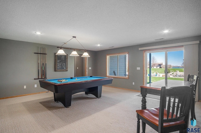 6601 Lenola Hts, Wentworth, SD 57075 - recreation room featuring a textured ceiling, light carpet, and baseboards