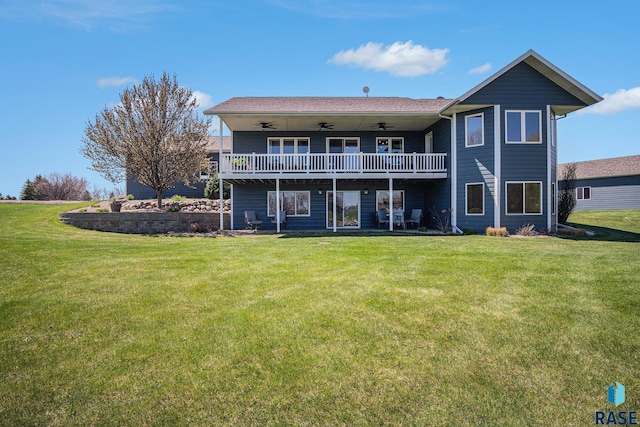 6601 Lenola Hts, Wentworth, SD 57075 - rear view of house with a ceiling fan, a yard, and a deck