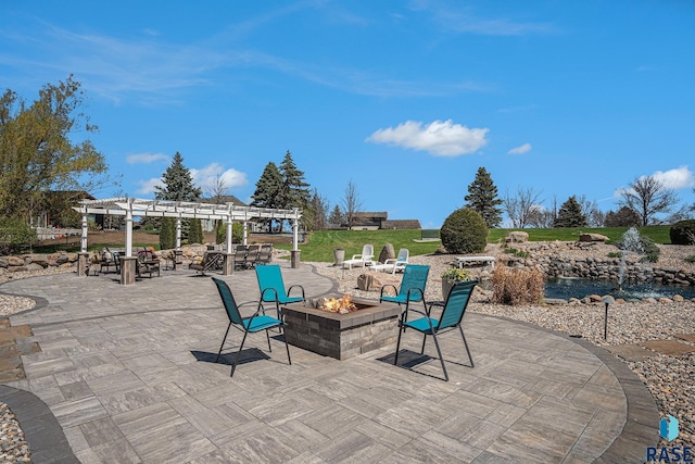 6601 Lenola Hts, Wentworth, SD 57075 - view of patio / terrace with an outdoor fire pit and a pergola