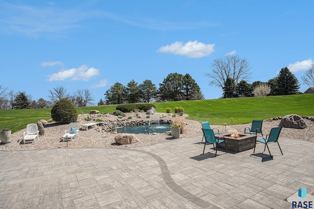 6601 Lenola Hts, Wentworth, SD 57075 - view of patio featuring a fire pit