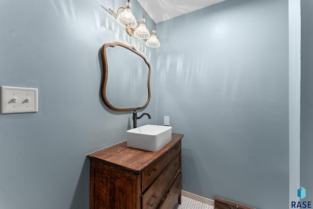20395 Northgrove Loop, Brookings, SD 57006 - bathroom featuring vanity and baseboards
