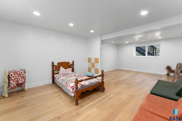 20395 Northgrove Loop, Brookings, SD 57006 - bedroom featuring baseboards, recessed lighting, and light wood-type flooring
