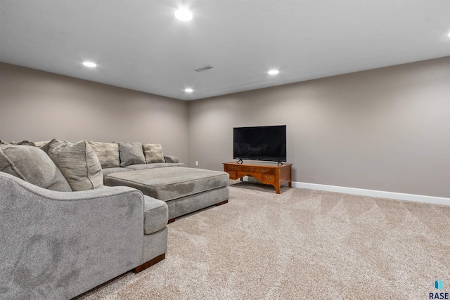1120 Blaine St, Larchwood, IA 51241 - living area featuring carpet flooring, visible vents, baseboards, and recessed lighting